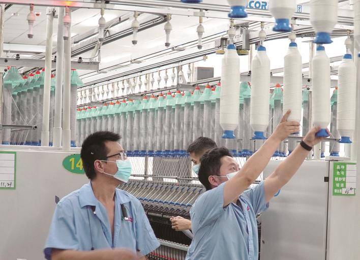 尤溪： 塑膠廢品化身再生絲